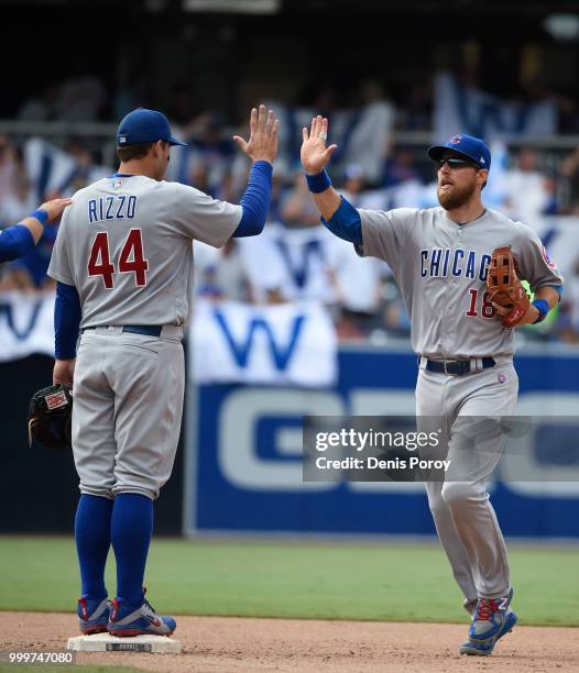 Ben Zobrist of the Chicago Cubs high-fives Anthony Rizzo after defeating the San Diego Padres 7-4 at PETCO Park on July 15, 2018 in San Diego,...