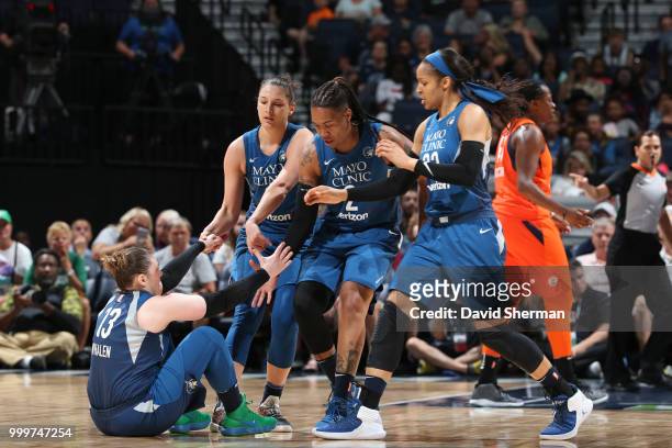 Minnesota Lynx help Lindsay Whalen up during game against the Connecticut Sun on July 15, 2018 at Target Center in Minneapolis, Minnesota. NOTE TO...