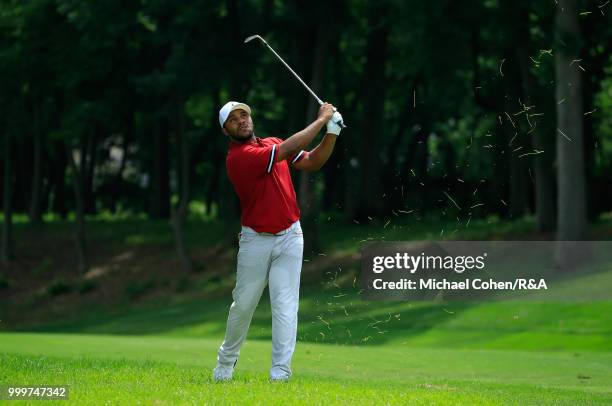 Harold Varner III hits his second shot on the eighth hole during the fourth and final round of the John Deere Classic held at TPC Deere Run on July...