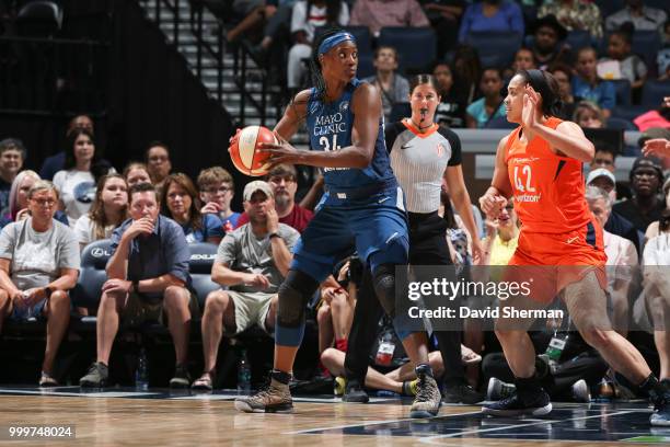 Sylvia Fowles of the Minnesota Lynx handles the ball against the Connecticut Sun on July 15, 2018 at Target Center in Minneapolis, Minnesota. NOTE TO...