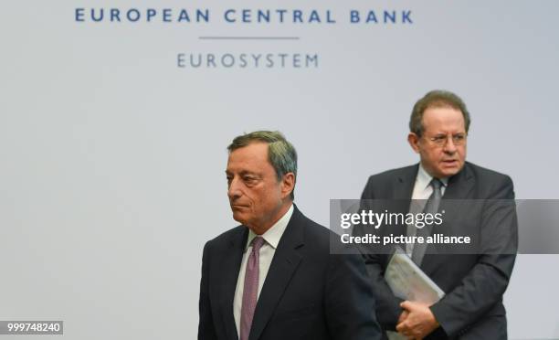 Mario Draghi , the president of the European Central Bank , and his deputy Vitor Constancio at a press conference in the bank's headquarters in...