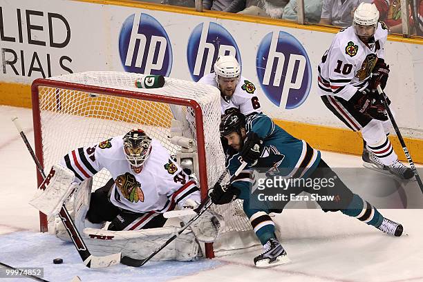 Scott Nichol of the San Jose Sharks shoots a wrap-around on goaltender Antti Niemi of the Chicago Blackhawks in the third period of Game Two of the...