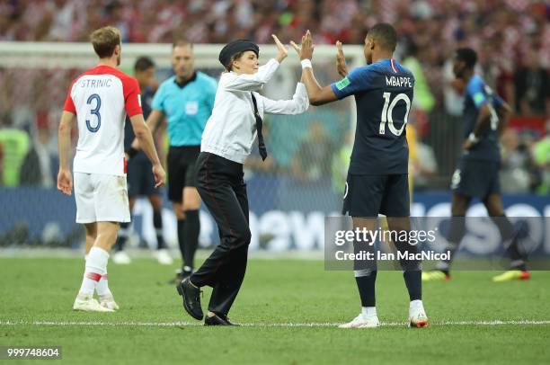 Anti-Kremlin Russian protest group Pussy Riot has taken responsibility for the invasion, Olga Kurachyova, a member of the punk band, said she was one...