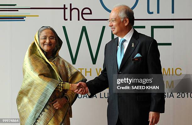 Malaysia's Prime Minister Najib receives Bangladesh's Prime Minister Sheikh Hasina for an opening ceremony of the 6th World Islamic Economic Forum in...