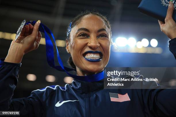 Captain Queen Harrison poses with her medal as Team USA celebrate victory during Day Two of the Athletics World Cup 2018 presented by Muller at...