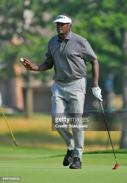 Vijay Singh acknowledges the gallery on the 16th hole during the final round of the PGA TOUR Champions Constellation SENIOR PLAYERS Championship at...