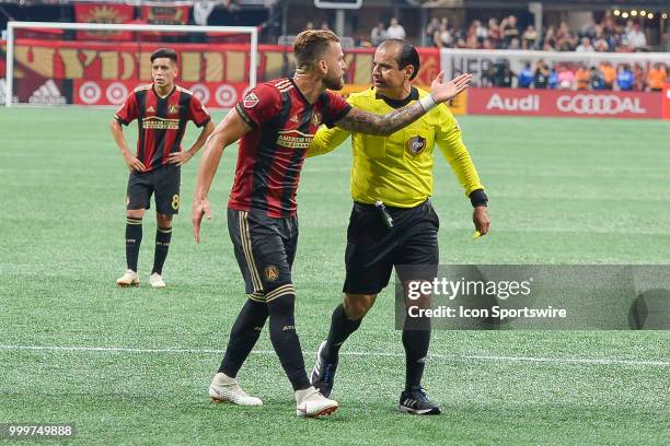 Atlanta's Leandro González Pirez makes his case with the referee during the match between Atlanta and Seattle on July 15th, 2018 at Mercedes-Benz...