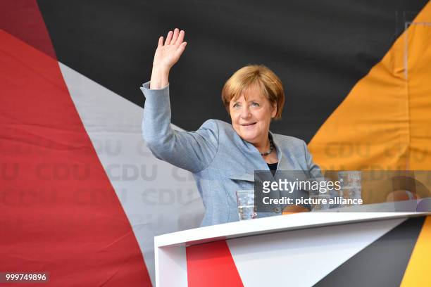 German Chancellor Angela Merkel waves during an election campaign event of the CDU party in Neustadt an der Weinstrasse, Germany, 7 September 2017....