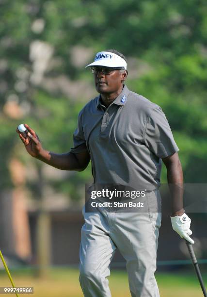 Vijay Singh acknowledges the gallery on the 16th hole during the final round of the PGA TOUR Champions Constellation SENIOR PLAYERS Championship at...