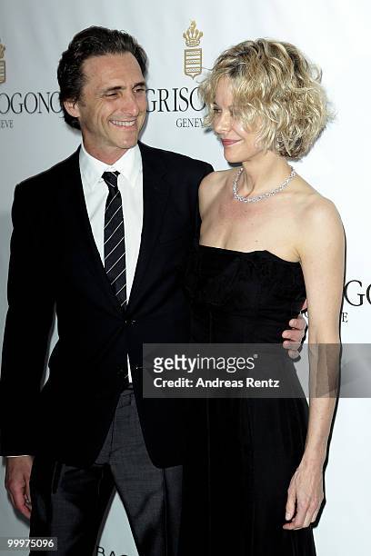 Producer Lawrence Bender and Actress Meg Ryan attend the de Grisogono party at the Hotel Du Cap on May 18, 2010 in Cap D'Antibes, France.