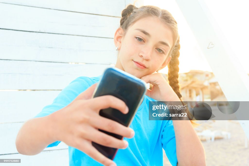Beautiful girl making selfies