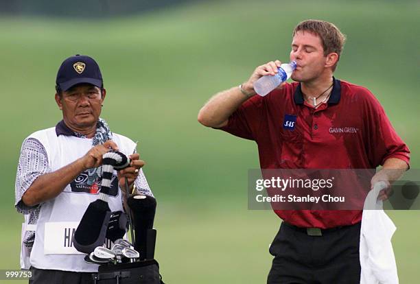 Per Haugsrud of Norway takes a drink at the 15th Tee during the first day of the Davidoff Nations Cup held at the Royal Selangor Golf Club, Kuala...