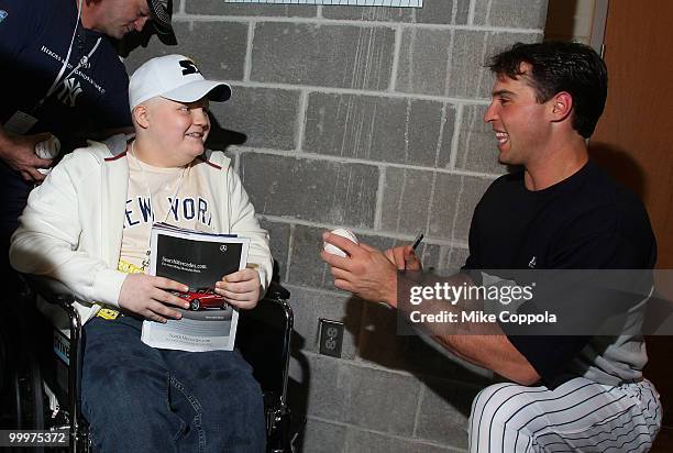 Jack Williams and New York Yankees first baseman Mark Teixeira attend the starter event at NY Yankees batting practice at Yankee Stadium on May 18,...