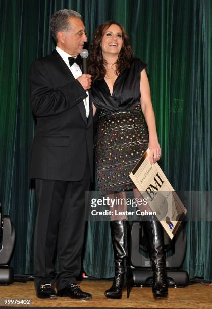 President and CEO Del Bryant and songwriter Kara DioGuardi speak onstage during the 58th Annual BMI Pop Awards held at the Beverly Wilshire Hotel on...