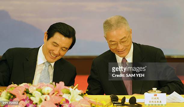 Taiwan President Ma Ying-jeou and Premier Wu Dun-yih smile during the press conference at the Presidential Office in Taipei on May 19, 2010....