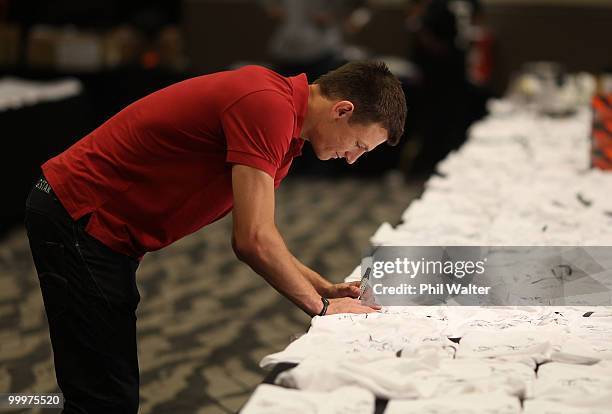 Tommy Smith of the New Zealand All Whites signs jerseys during a signing session at the Sky City Hotel on May 19, 2010 in Auckland, New Zealand.