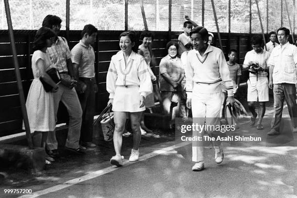 Crown Prince Akihito and Crown Princess Michiko are seen on arrival at a tennis court on August 7, 1986 in Karuizawa, Nagano, Japan.
