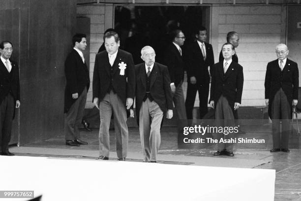 Emperor Hirohito attends the memorial ceremony for war dead on the 41st anniversary of the WWII Surrender at Nippon Budokan on August 15, 1986 in...