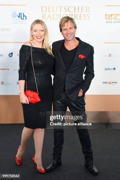 Musician Steve Norman of the British band Spandau Ballet and his company Sabrina at the German Radio Award 2017 at the plaza of the Elbphilharmonie...