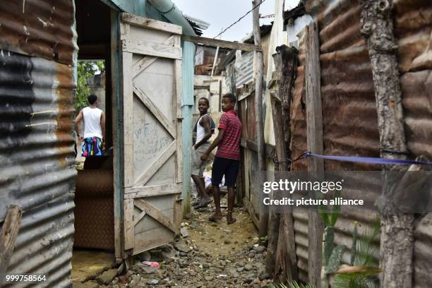 Two boys are reliefed after the dangerous hurricane 'Irma' has passed the city of Santo Domingo, Dominican Republic, 7 September 2017. The extent of...