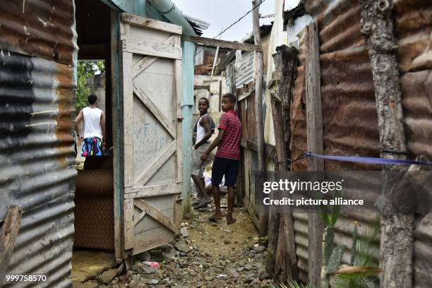 Dpatop - Two boys are reliefed after the dangerous hurricane 'Irma' has passed the city of Santo Domingo, Dominican Republic, 7 September 2017. The...