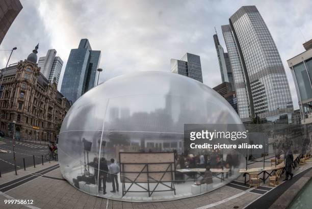 View of an inflatable and accessable bubble made of transparent plastic below the towers befoer the official opening on the Willy Brandt square in...