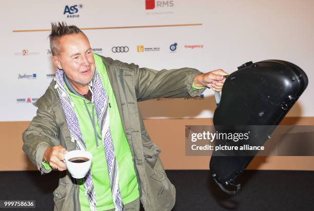 Violinist Nigel Kennedy arrives at the German Radio Award 2017 at the plaza of the Elbphilharmonie concert hall in Hamburg, Germany, 7 September...