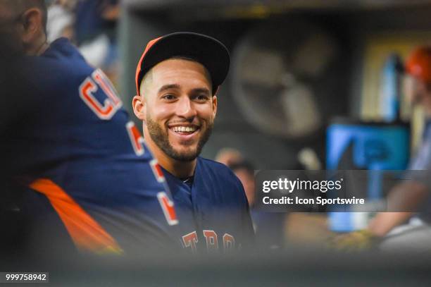 Houston Astros outfielder George Springer is all smiles in the dugout before the baseball game between the Detroit Tigers and the Houston Astros on...