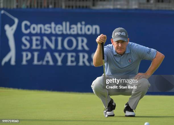 Jeff Maggert studies his putt on the 18th hole during the final round of the PGA TOUR Champions Constellation SENIOR PLAYERS Championship at Exmoor...