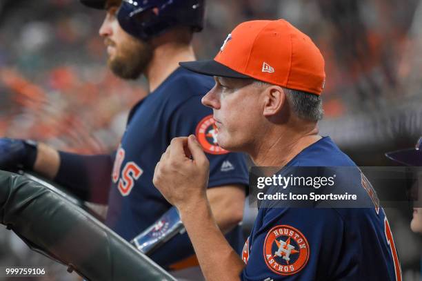 Houston Astros manager A.J. Hinch watches his team from the dugout during the baseball game between the Detroit Tigers and the Houston Astros on July...