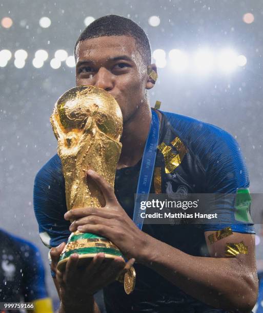 Kylian Mbappe of France celebrates with the World Cup Trophy following his sides victory in the 2018 FIFA World Cup Final between France and Croatia...