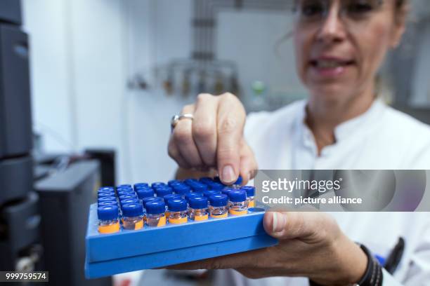 The technical and biological assistant Annette Rickert prepares samples for a high-pressure liquid chromatography for the analysis of drugs and...