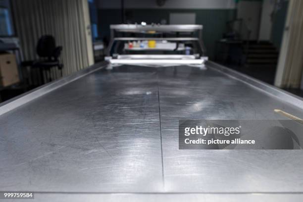 Autopsy tables can be seen at the Institute for Forensic Medicine in Duesseldorf, Germany, 8 September 2017. Some 18000 judicial autopsies are...