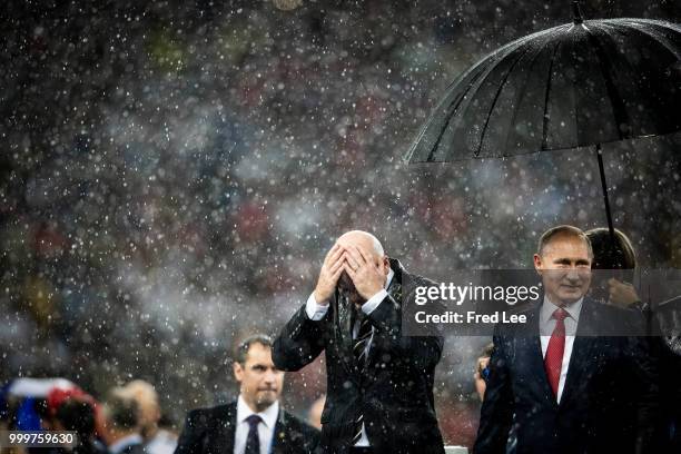 Russian President Vladimir Putin and FIFA President Gianni Infantino attend the award ceremony of the 2018 FIFA World Cup Russia Final between France...