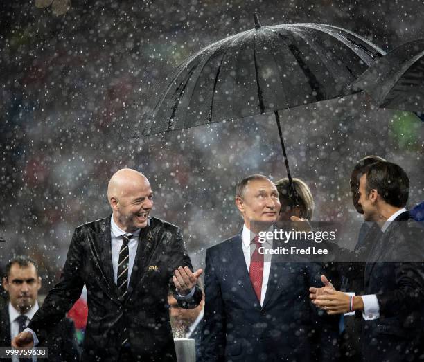 Russian President Vladimir Putin and FIFA President Gianni Infantino attend the award ceremony of the 2018 FIFA World Cup Russia Final between France...