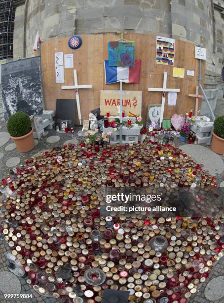 Numerous candles can be seen at the memorial site for victims of the Breitscheidplatz terrorist attack in Berlin, Germany, 8 September 2017. The...