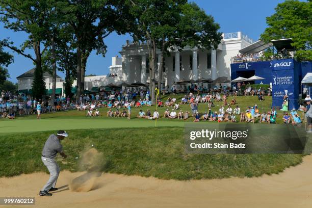 Vijay Singh plays a bunker shot on the 18th hole during the final round of the PGA TOUR Champions Constellation SENIOR PLAYERS Championship at Exmoor...