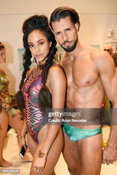 Models pose backstage at Miami Swim Week powered by Art Hearts Fashion Swim/Resort 2018/19 at Faena Forum on July 15, 2018 in Miami Beach, Florida.