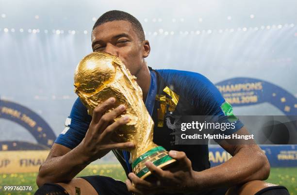 Kylian Mbappe of France celebrates with the World Cup Trophy following his sides victory in the 2018 FIFA World Cup Final between France and Croatia...