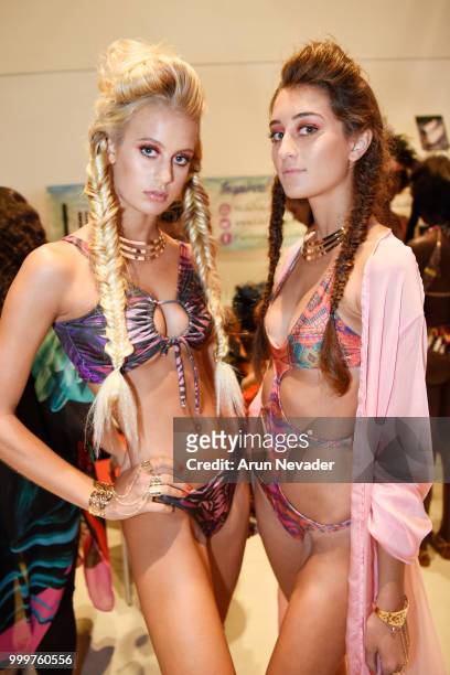 Models pose backstage at Miami Swim Week powered by Art Hearts Fashion Swim/Resort 2018/19 at Faena Forum on July 15, 2018 in Miami Beach, Florida.