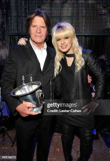 Musician John Fogerty and singer Orianthi pose during the 58th Annual BMI Pop Awards held at the Beverly Wilshire Hotel on May 18, 2010 in Beverly...