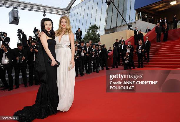 Chinese actress Fan Bingbing and Dutch model Doutzen Kroes arrive for the screening of "Des Hommes et des Dieux" presented in competition at the 63rd...