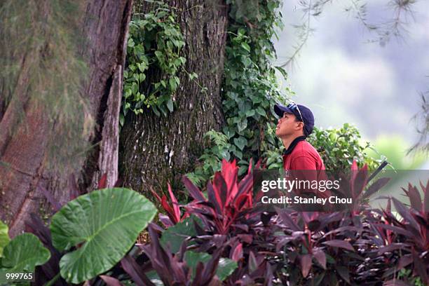 Lam Chih Bing of Singapore walk through the rough on his way to the 18th Tee during the first day of the Davidoff Nations Cup held at the Royal...