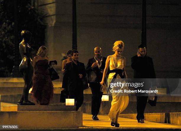 Mischa Barton and her entourage leave the Rosa Clara party at the National Palau on May 18, 2010 in Barcelona, Spain.