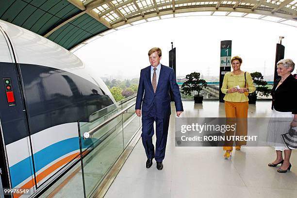 Dutch prince Willem-Alexander , his wife princess Maxima and minister of Economy Maria van der Hoeven arrive at the Maglev trainstation in Shanghai...