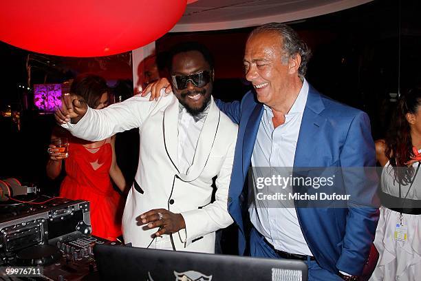 Will.i.am and Fawaz Gruosi attend the de Grisogono "Crazy Chic Evening" cocktail party at the Hotel Du Cap Eden Roc on May 18, 2010 in Antibes,...