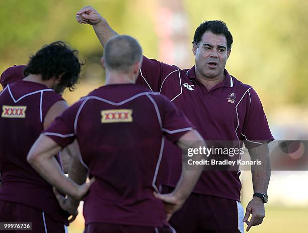 Coach Mal Meninga speaks to his captain Darren Lockyer at the Queensland Maroons State of Origin team fans day and training session held at Stockland...