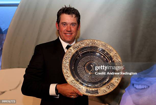 Lee Westwood of England poses with the Players' Player Award during the 2010 Tour Dinner prior to the BMW PGA Championship on the West Course at...