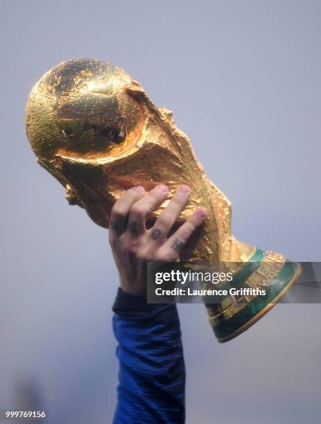 Antoine Griezmann of France holds the World Cup trophy aloft during the victory celebrations after the 2018 FIFA World Cup Russia Final between...