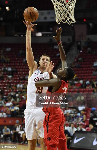 Vladimir Brodziansky of the Cleveland Cavaliers shoots against Chris Boucher of the Toronto Raptors during a quarterfinal game of the 2018 NBA Summer...